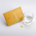 The Vitamin C confezione con bicchiere e capsula